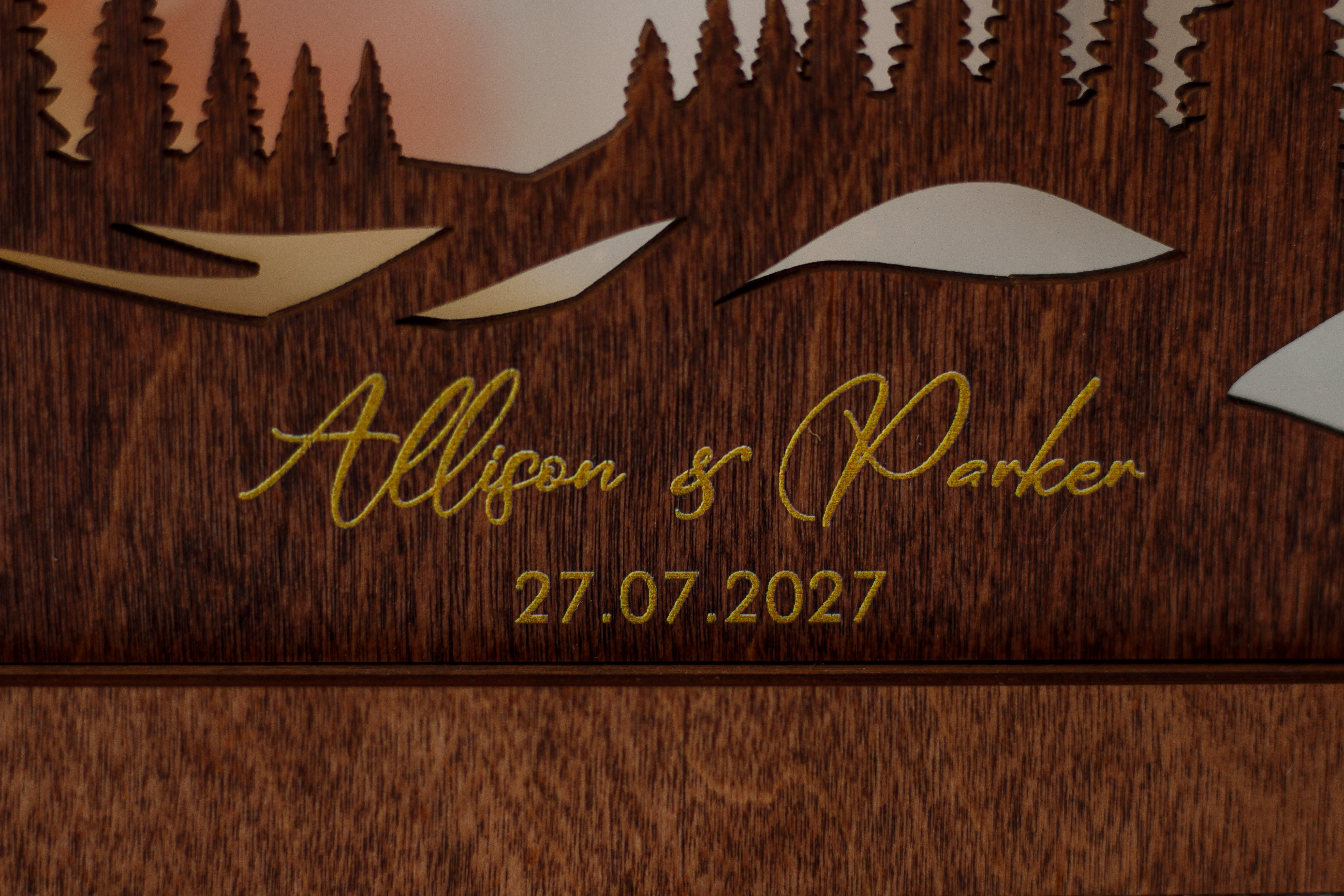 Rustic wooden unity sand frame with mountain scenery