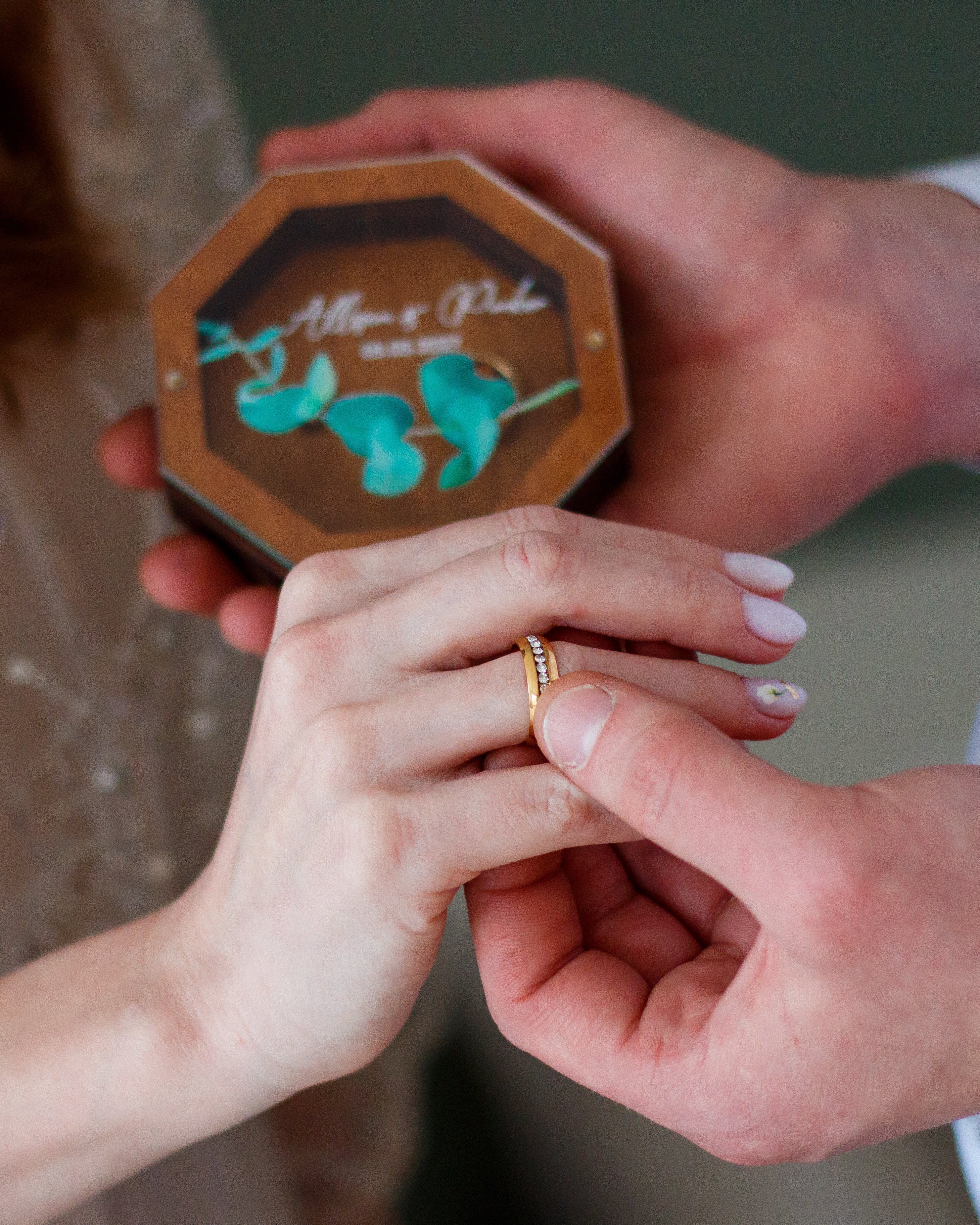 Wooden hexagon ring box with engraved names and date