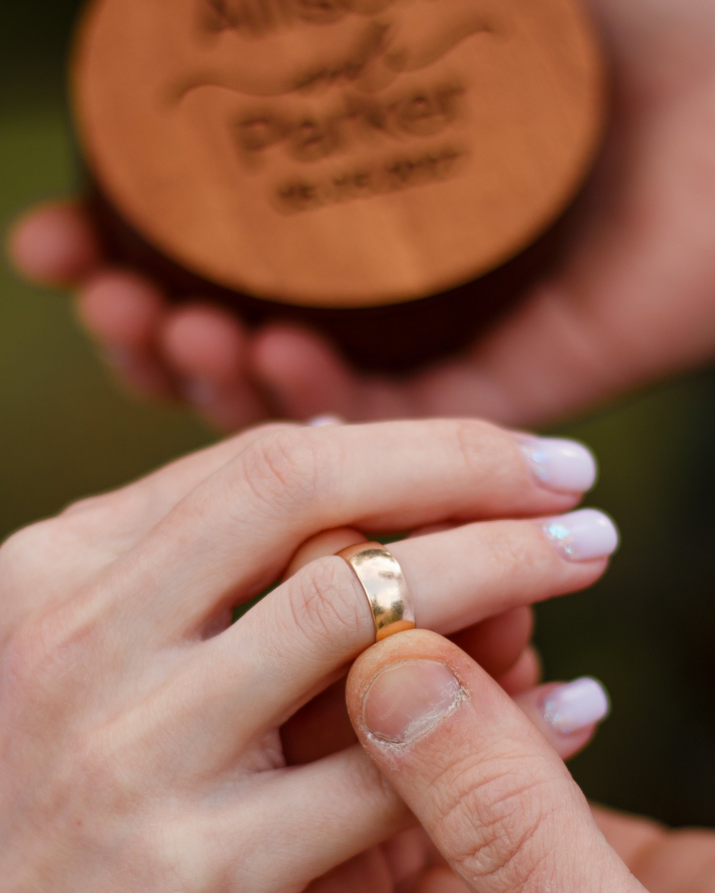 Wooden wedding ring holder with heart details