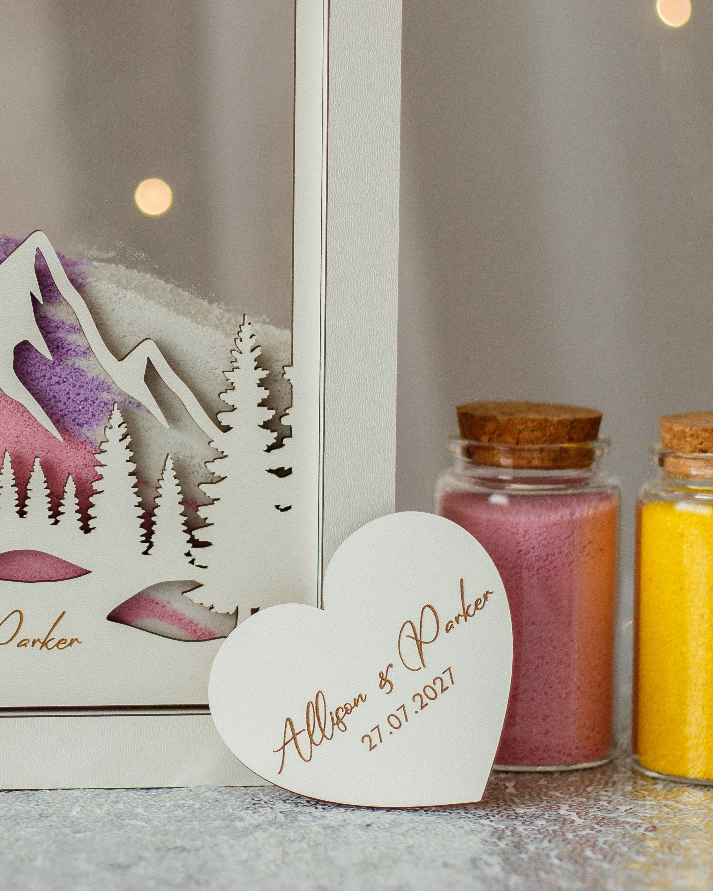 Unity sand frame with mountains for outdoor wedding ceremony