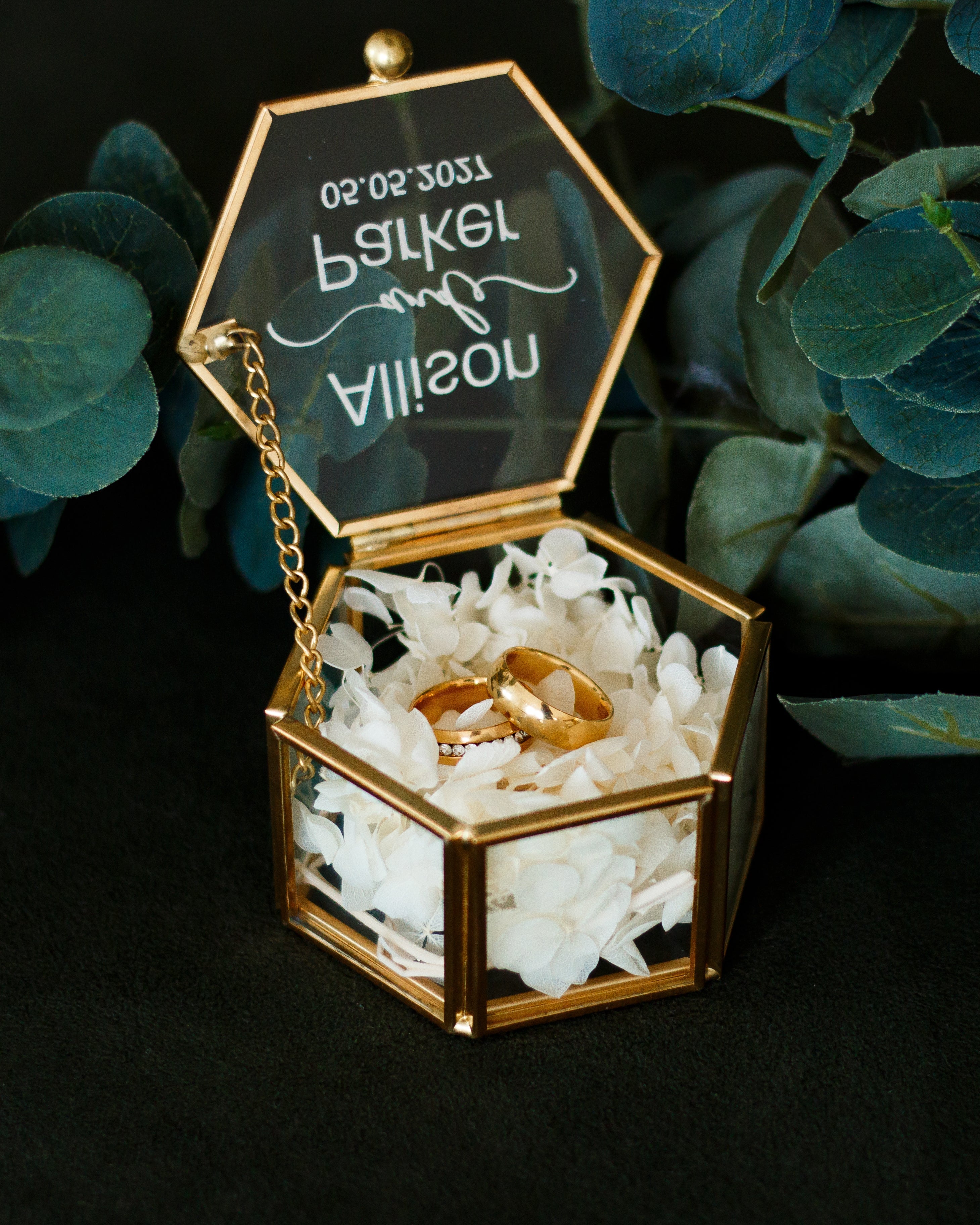 Gold hexagon ring box with floral filling